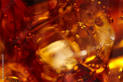 cola with ice cubes  macro