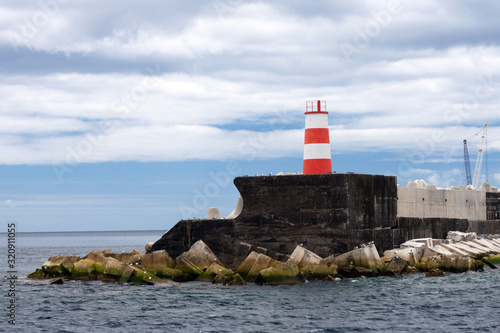 Portugal, Ponta Delgada, Azores. Old beautiful lighthouse. The island of San Miguel.