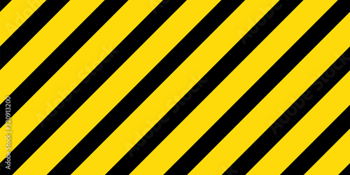 Caution black and yellow striped seamless vector pattern.