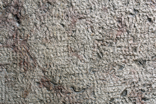 Bush-hammered white limestone rough surface