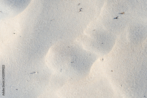 White Caribbean sand. Structure of sand. Background, texture or pattern. Quintana roo. Yucatan. Mexico.