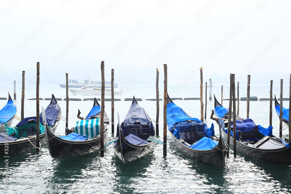 Venice, Italy, 01/10/2020 , The gondola is a traditional, flat-bottomed Venetian rowing boat, well suited to the conditions of the Venetian lagoon.