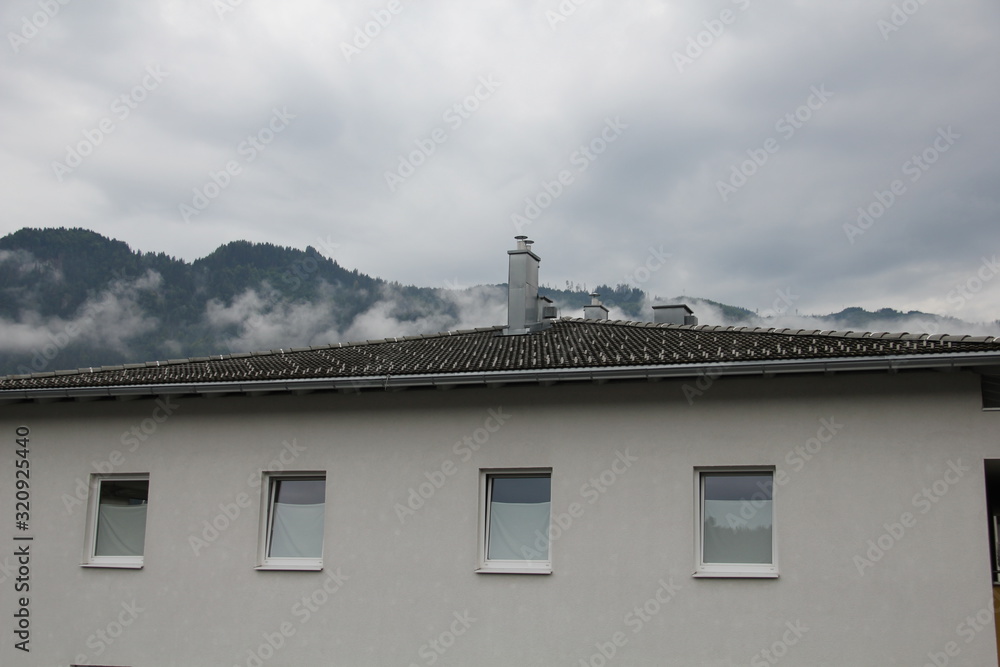 house with clouds