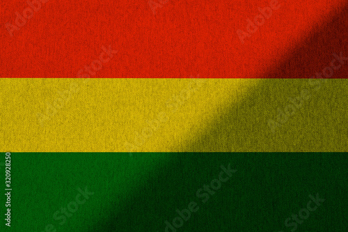 Green yellow red reggae background on canvas texture