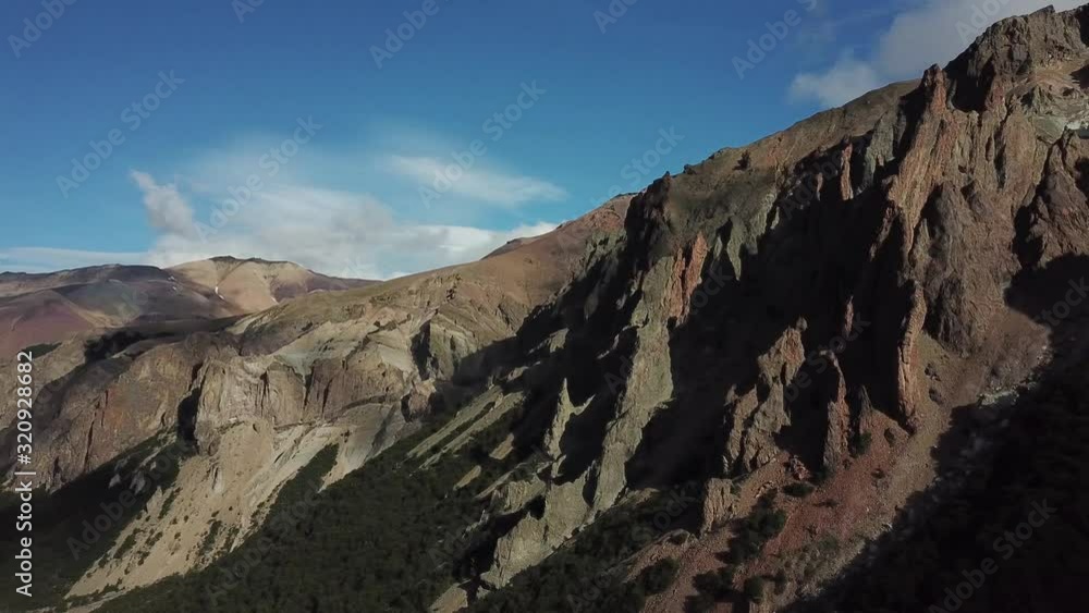 Aerial View of Rocky Mountain Formation in Rural Chile Aysen Region on Sunny Summer Day Aerial View of Rocky Mountain Formation in Rural Chile Aysen Region on Sunny Summer Day