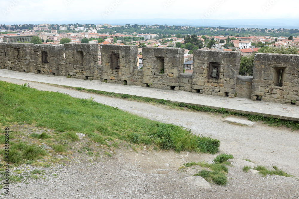 Carcassonne, France - April 27: Capture photo of the wall on April 27, 2017 in Carcassonne, France. Carcassonne, France - April 27: Capture photo of the wall on April 27, 2017 in Carcassonne, France.