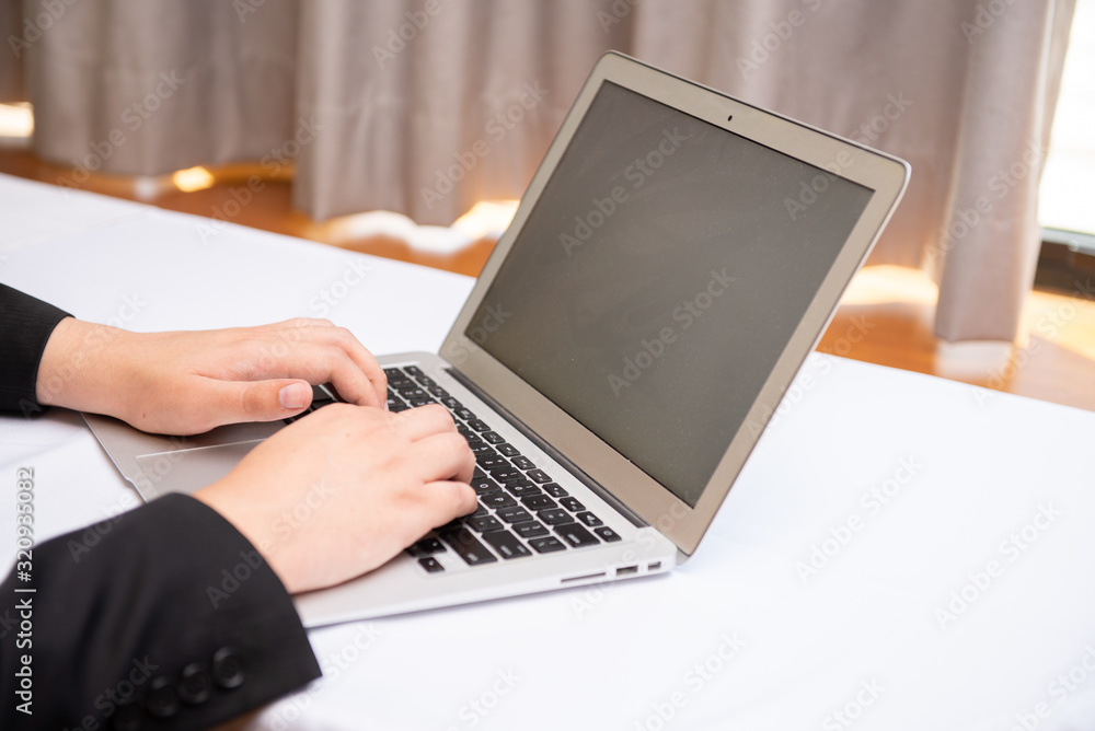 man using a laptop man using a laptop