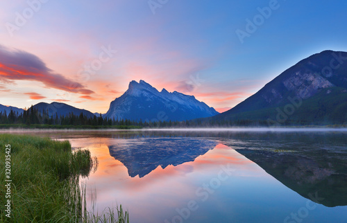 Fototapeta Naklejka Na Ścianę i Meble -  Beautiful sunrise over Vermillion Lake , Banff National Park, Alberta, Canada. Vermilion Lakes are a series of lakes located immediately west of Banff, Alberta