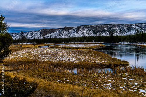SNOW CAPPED MOUNTAINS ALONG MADISON RIVER, YELLOWSTONE
