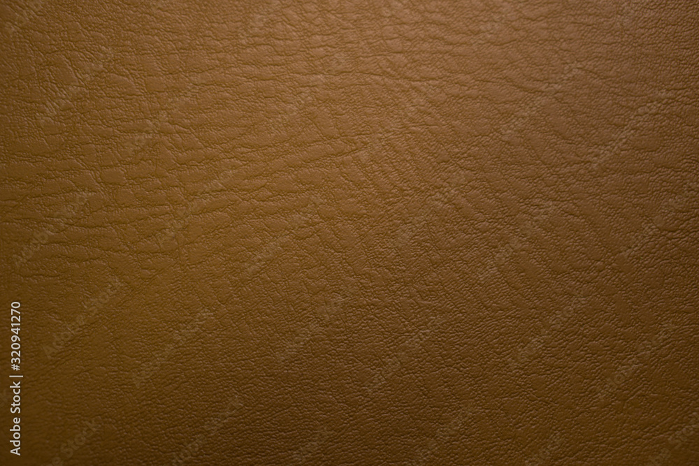 Dark brown leather material texture, useful as background for design-works Dark brown leather material texture, useful as background for design-works