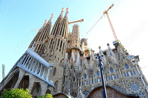 Cathedral of La Sagrada Familia. It is designed by architect Antonio Gaudi and is being built since 1882 with the donations of people photo