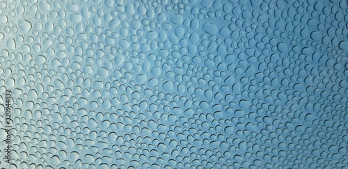 water drops on blue surface