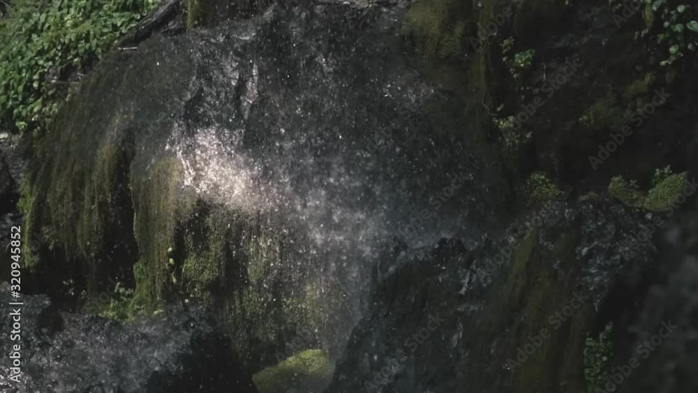 Waterfall and rock with moss in Los Andes Mountains of Chile Waterfall and rock with moss in Los Andes Mountains of Chile