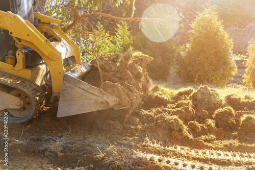 Bilde på lerret The bulldozer moves soil construction equipment digging ground