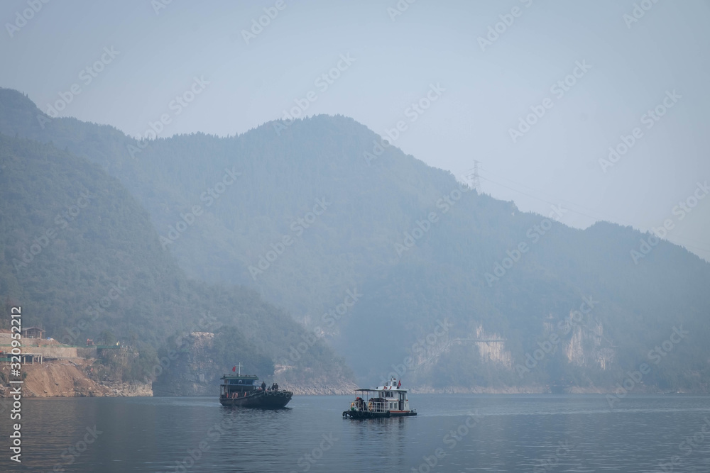 Chinese fisherman's sailing boat at Yangtze river for the traveler along with the three gorges area