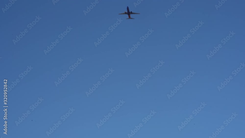 4K Airplane Flying Through the Sky Toward Arrival at Destination 4K Airplane Flying Through the Sky Toward Arrival at Destination