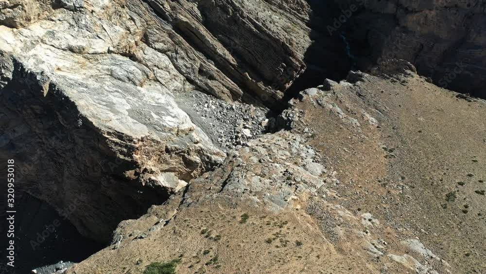 Aerial shot of a cliff in spiti valley , himachal pradesh | scary Aerial shot of a cliff in spiti valley , himachal pradesh | scary