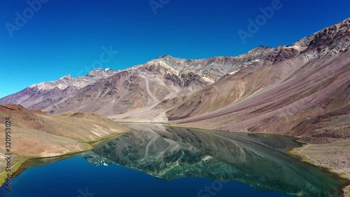 Aerial shot of crystal clear himalayan lake | chandratal lake , spiti valley photo