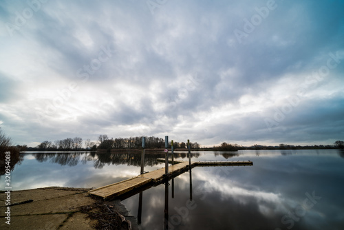 Wallpaper Mural A Pier at sunrise on a lake. Torontodigital.ca