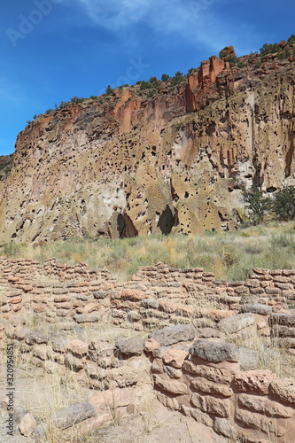 Ruins of the ancient pueblo of Tyuonyi at Bandelier National Monument, New Mexico photo
