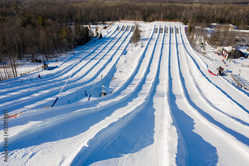 Obraz na płótnie Snow tubing runs in the winter in Canada w salonie