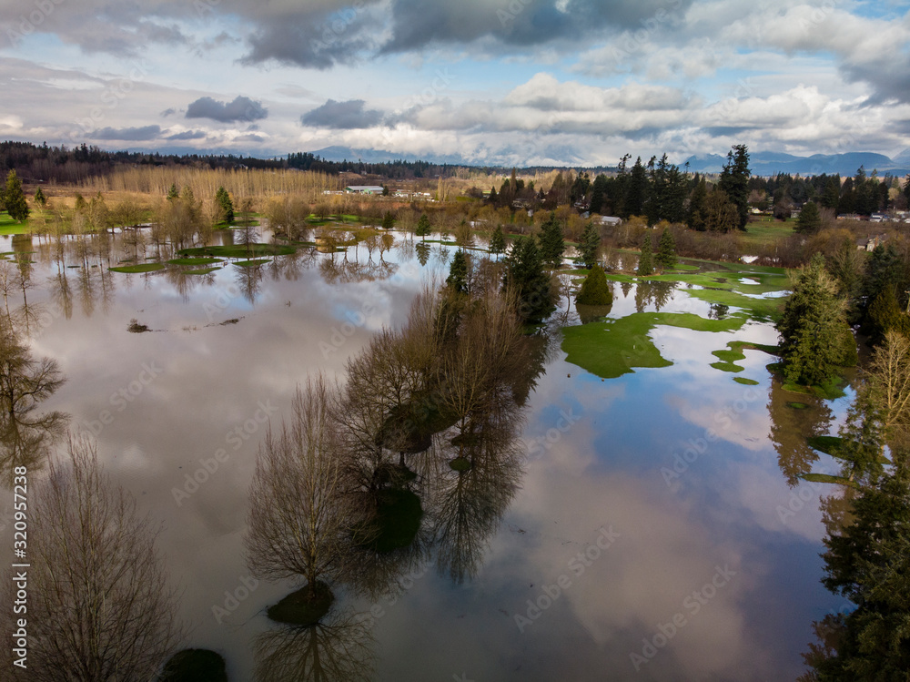 Aerial of extreme flooding on golf course after rain storm