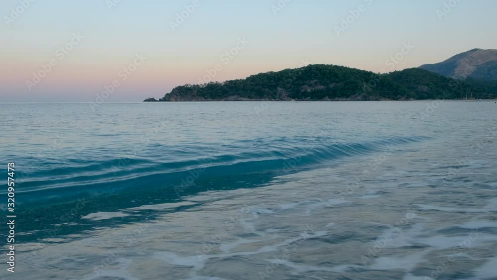Oludeniz, Turkey. Waves on the Mediterranean Sea at Sunrise Oludeniz, Turkey. Waves on the Mediterranean Sea at Sunrise