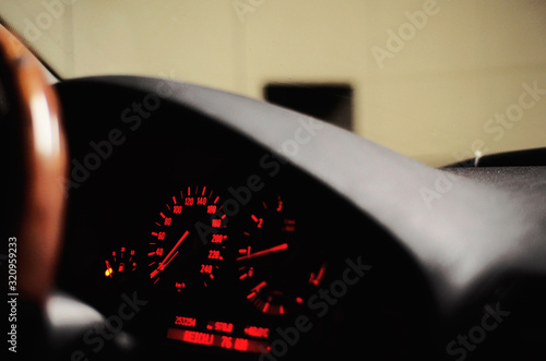 The old tachometer with orange light