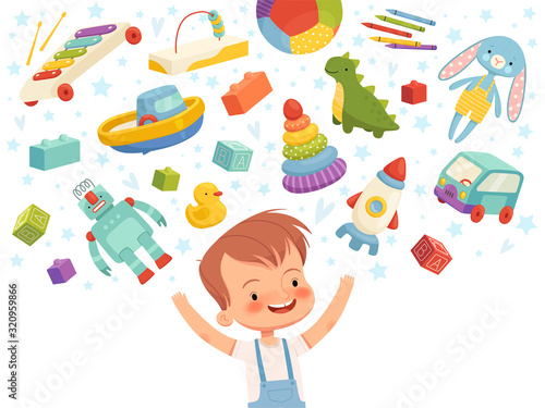 Joyful boy with different toys flying around. Concept child dreams about children's toys.