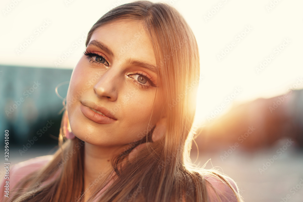 Close up portrait of a woman walking in the street