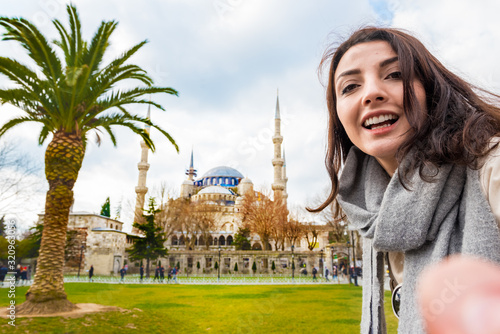 Photography Beautiful woman traveler tourist take selfie with view of Sultanahmet Mosque or