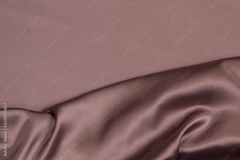 Fototapeta premium Fabric satin silk drapery. Purple textile