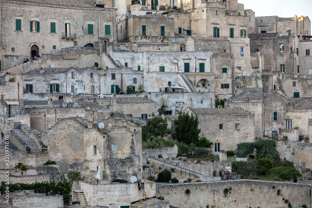  View of the Sassi di Matera a historic district in the city of Matera, well-known for their ancient cave dwellings. Basilicata. Italy