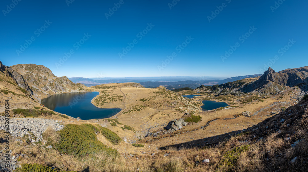 Beautiful panoramic view of the circus of the Seven Rila Lakes, clear blue sky in the background, Rila Mountain, Bulgaria.