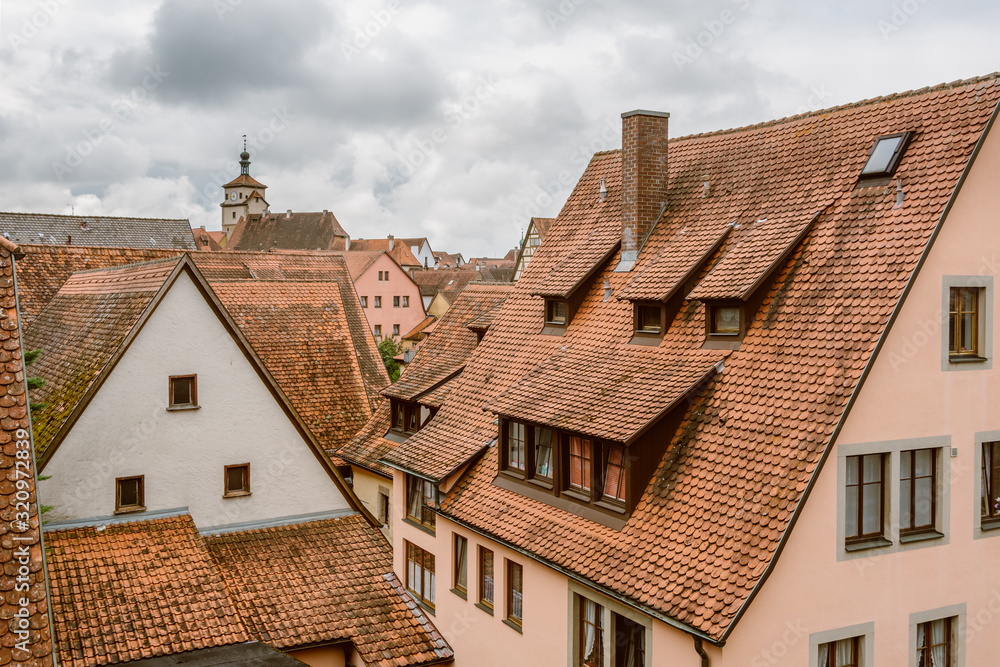 A view of the traditional German houses and roofs in Rothenburg ob der Tauber in Germany.