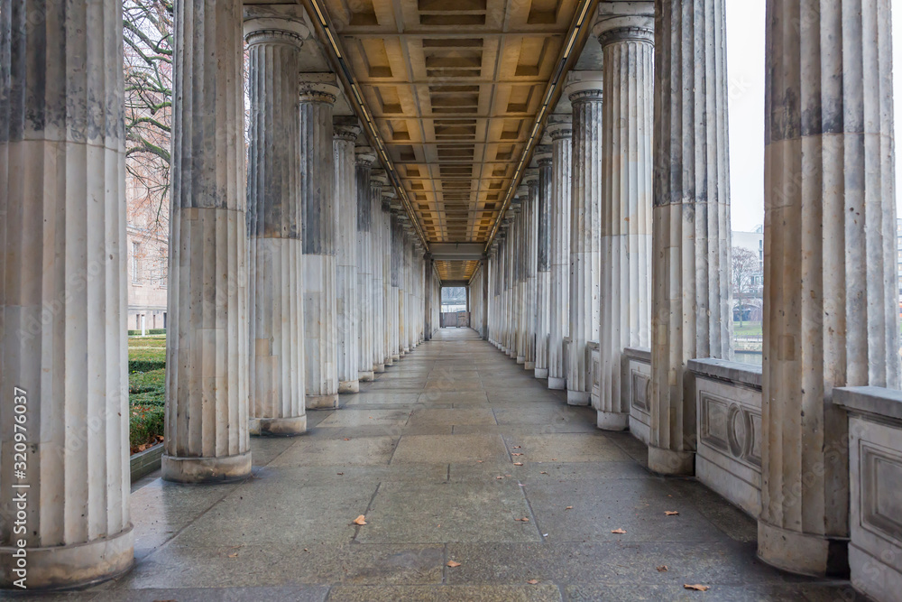 BERLIN, GERMANY - Jan 9, 2020: View into the so-called Säulengang: a passage with colonnades on the left and right. Located at the Kolonnadenhof (colonnade garden). UNESCO World Heritage Museum Island