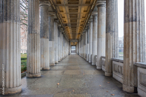 BERLIN, GERMANY - Jan 9, 2020: View into the so-called Säulengang: a passage with colonnades on the left and right. Located at the Kolonnadenhof (colonnade garden). UNESCO World Heritage Museum Island