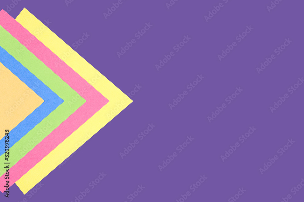 Multicolored triangles on a purple background.