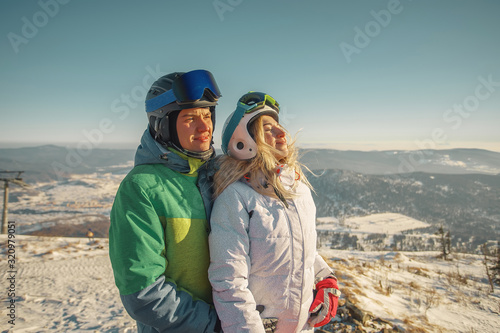 Couple On Ski Holiday In Mountains