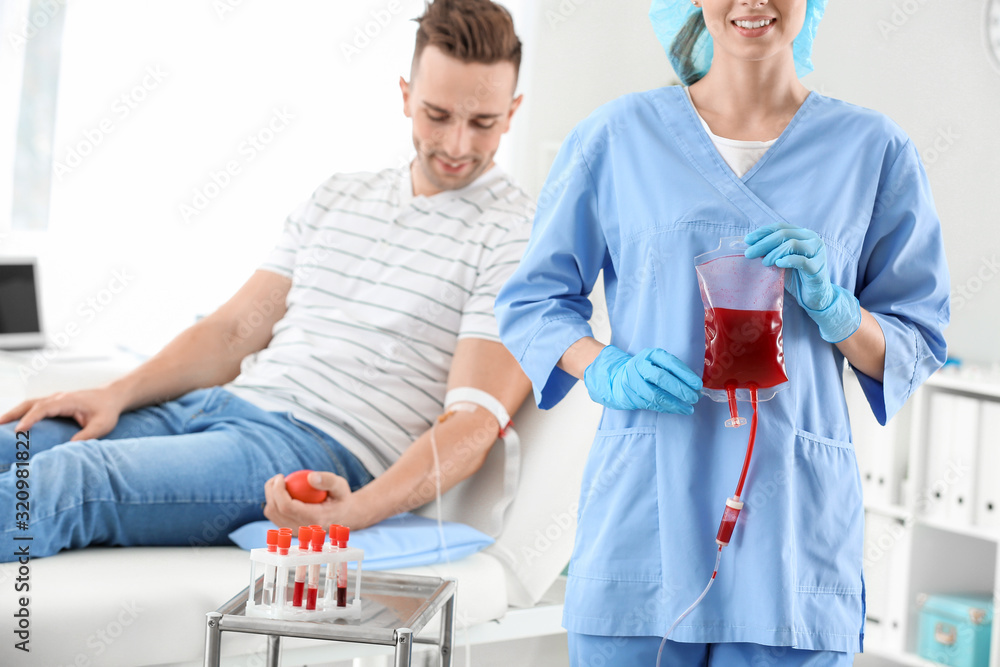 Fototapeta premium Man donating blood in hospital
