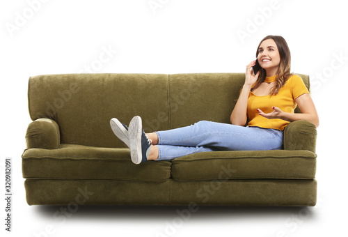 Young woman talking by phon...