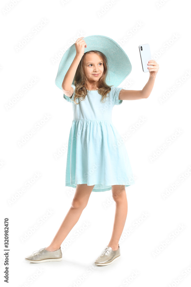 Cute little girl taking selfie on white background Cute little girl taking selfie on white background