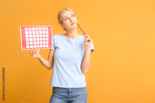 Young woman with menstrual ...