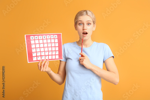 Young woman with menstrual ...