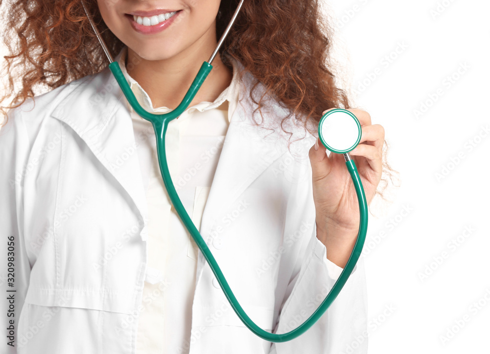 Young African-American doctor with stethoscope on white background Young African-American doctor with stethoscope on white background