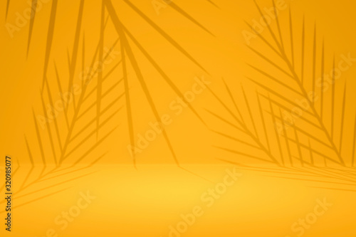 Abstract yellow background with summer palm pattern on empty studio backdrops. Tropical style for showing product. 3D rendering.