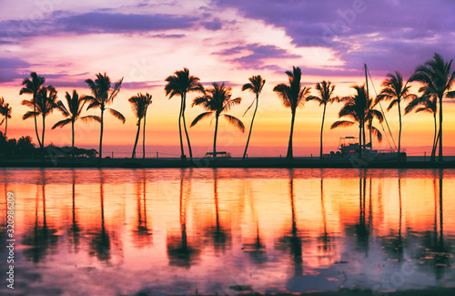 Hawaii beach sunset scenic panoramic banner background for summer vacation, romantic honeymoon travel destinations. © Maridav