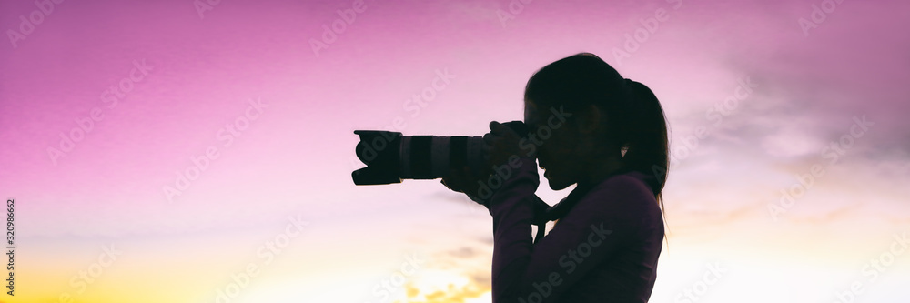 Professional photographer woman silhouette taking night photo during Professional photographer woman silhouette taking night photo during