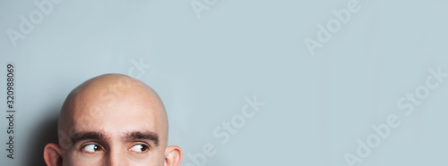 Fotografia, Obraz Emotional portrait of surprised bald man