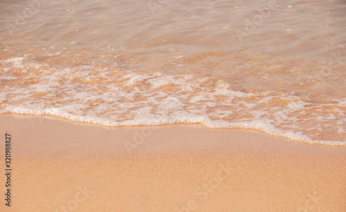 Wave & Sand beach background , holiday or relax in summer concept.